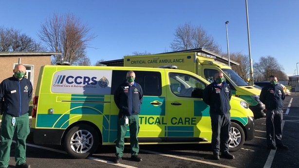 Members of the NAS Critical Care and Retrieval Services are pictured here with two of their dedicated transportation vehicles