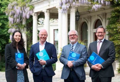 Report launch with Minister Stephen Donnelly and other members of the Children, Adolescent and Young Adult Cancers (CAYA) at the HSE National Cancer Control Programme (NCCP).   The group in standing in a line holding a copy of the report.