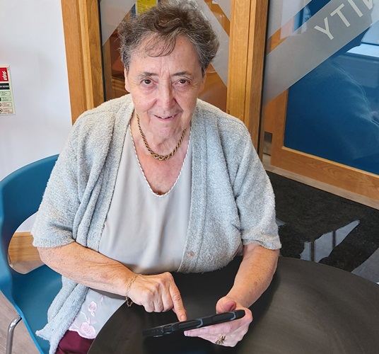 Catherine, EVE Club Member with her tablet