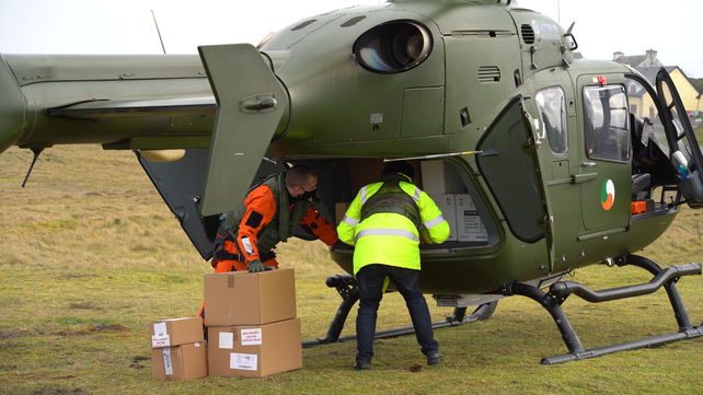 Members of the Irish Defence Forces deliver COVID-19 vaccines to remote islands off the west coast of Ireland