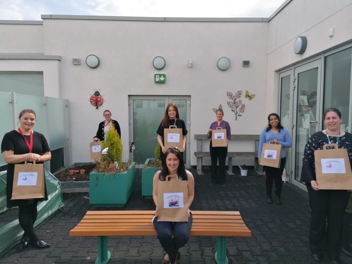 Staff in Mental Health Services for Older Persons in HSE North Dublin with the Golden Moments packs, ready to be delivered to their service users.
