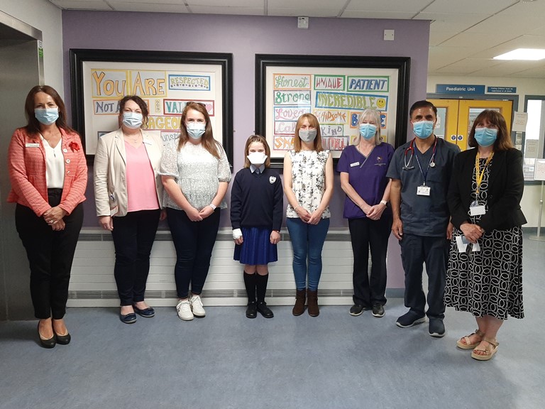 Launching the ‘Bravery and Courage of Children’ Art Project (l to r) Sandra McCarthy, Director of Nursing, MRHP; Maura Rice, Assistant Director of Nursing, MRHP; Jenny Kelly, Fourth Class Teacher at Portarlington Presentation Primary School; Saoirse Ryan; Sinead Walsh; Elaine O' Brien-Doyle, Acute Paediatric Link Nurse(CNSp), MRHP; Dr Muhammad Tariq, Consultant Paediatrician, MRHP; Berna Keating, CNM2 Paediatric Unit, MRHP.