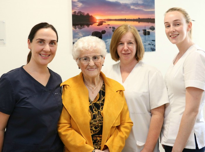 Mae Reilly from Finea, Co Cavan who was a patient in the UHG Coronary Care Unit in 2019 and whose daughters and sons used the Croí Family Room during her stay, with from left: Sinead Duke, Clinical Nurse Manager; and staff nurses Michelle Munnelly and Katie McCormack.