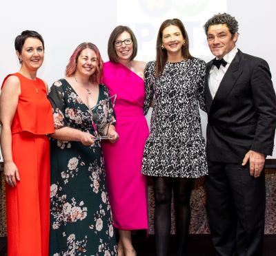 A group of 4 women and 1 man from the National Ambulance Service nurse-led children’s repatriation service at the award ceremony