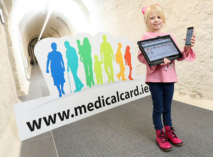 Child holding smartphone and tablet at mymedicalcard.ie launch in Dr Steevens' Hospital Child holding smartphone and tablet at mymedicalcard.ie launch in Dr Steevens' Hospital