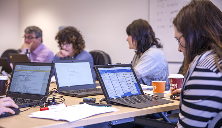 Catherine and digital team at work Catherine and digital team at work