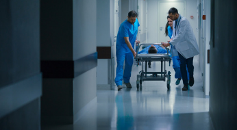 Male on hospital trolley image Male on hospital trolley image