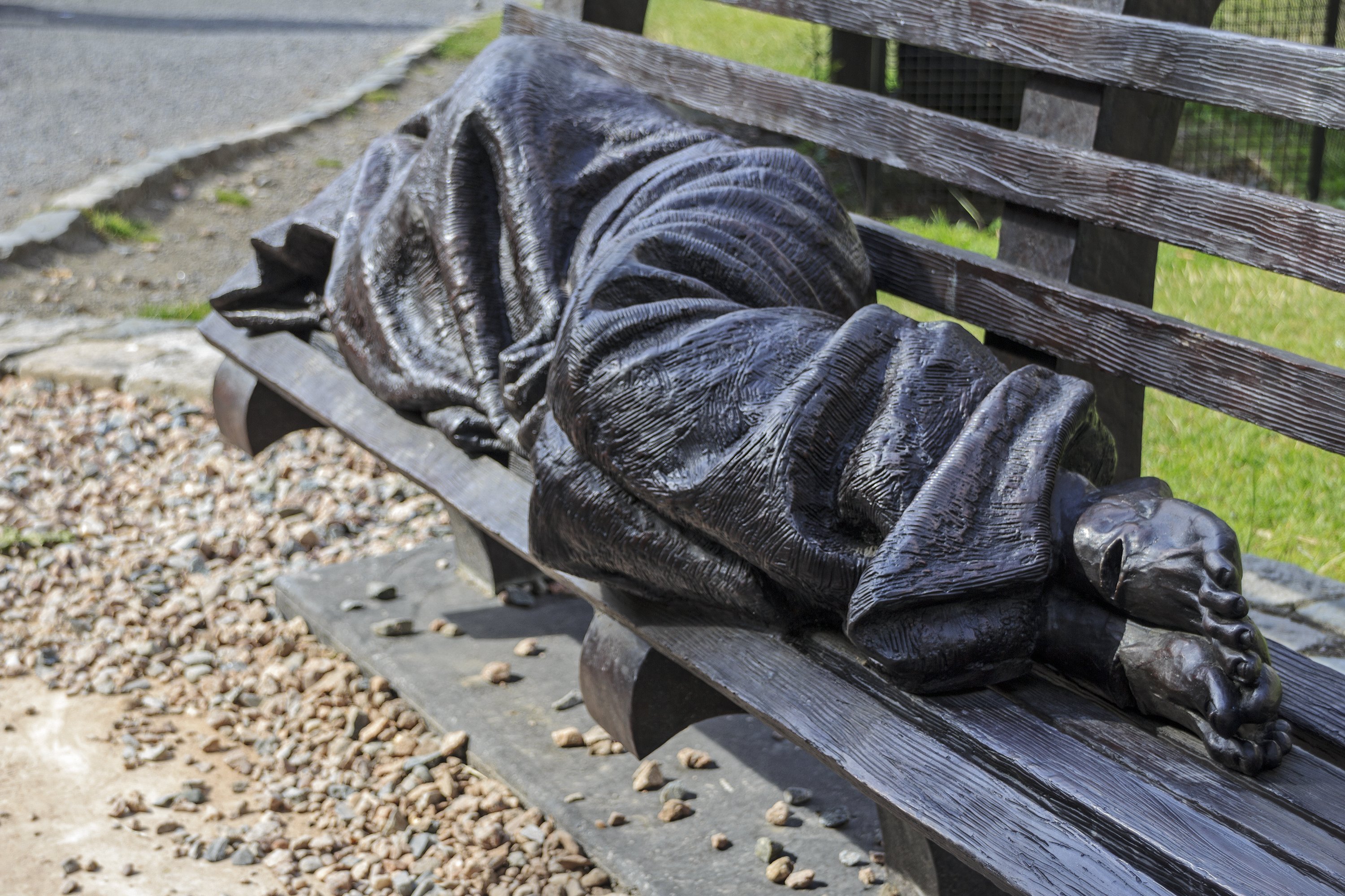homeless statue